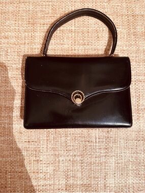 Vintage Gucci Black Top-Handle Leather purse from the late 1960s